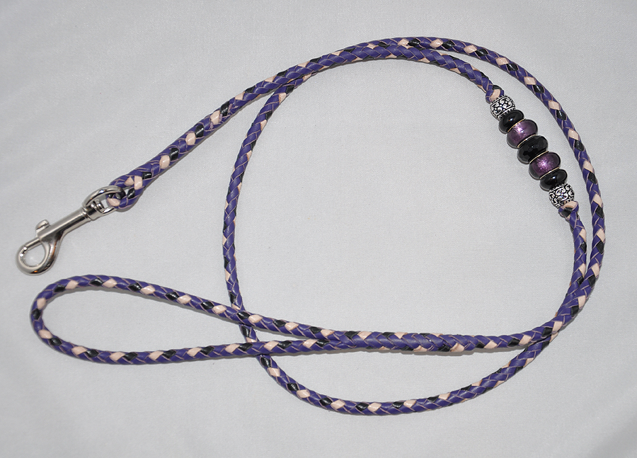  6 strands - purple, black and natural tan 